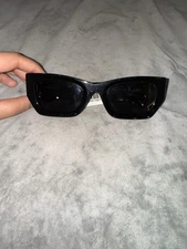 Miu Miu Solid Dark Grey Lenses Black Frame. Rectangle-shaped Frame Sunglasses