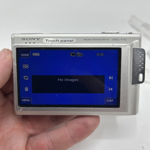 Fotocamera digitale Sony argento Cyber Shot DSC-T70 8,1MP e batteria caricabatterie - testata - Foto 10 di 10