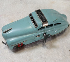Schuco Fex 1111 tin metal wind up car , US Zone germany 1940's