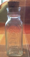 Four Ounces Pure Honey EMPTY Bottle, Embossed Beehive "Four Ounces Pure Honey"