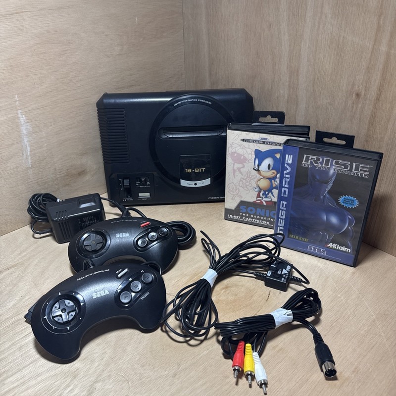 Sega Mega Drive Black Console With 2 Controllers  and 2 games. Tested Working