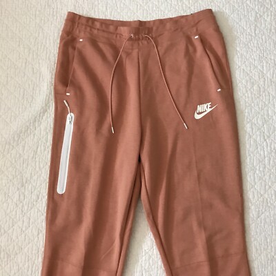 peach nike joggers