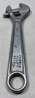 Silver 6" adjustable crescent wrench with worn handle, engraved “706 PROTO TOOLS FORGED ALLOY STEEL” on side.