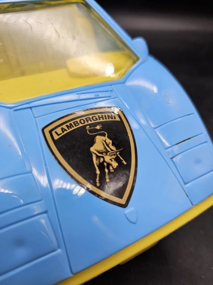 Coche de plástico Lamborghini Countach Tootsie Toys azul amarillo de colección años 80 Foto 2 de 4