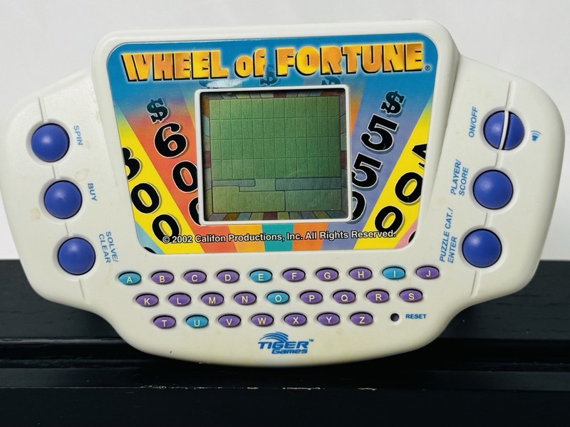 Tiger Electronics Wheel of Fortune Handheld Electronic Game