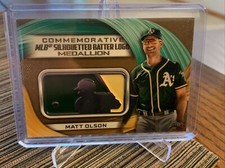 2022 Topps Series 1 MLB Logo Medallion Commemorative Relics Gold /75 Matt Olson