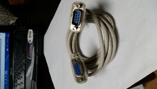 CABLE with female and male 9 pin connector about 6.5 ft long in good condition