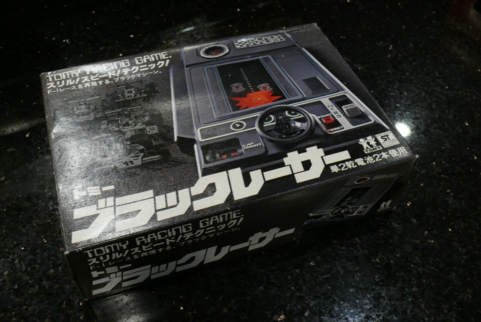 Vintage TOMY BLACK RACER Electronic Handheld tabletop arcade video game