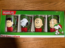 NIB ICUP PEANUTS SET OF 4 PINT CHRISTMAS HOLIDAY GLASSES NIB