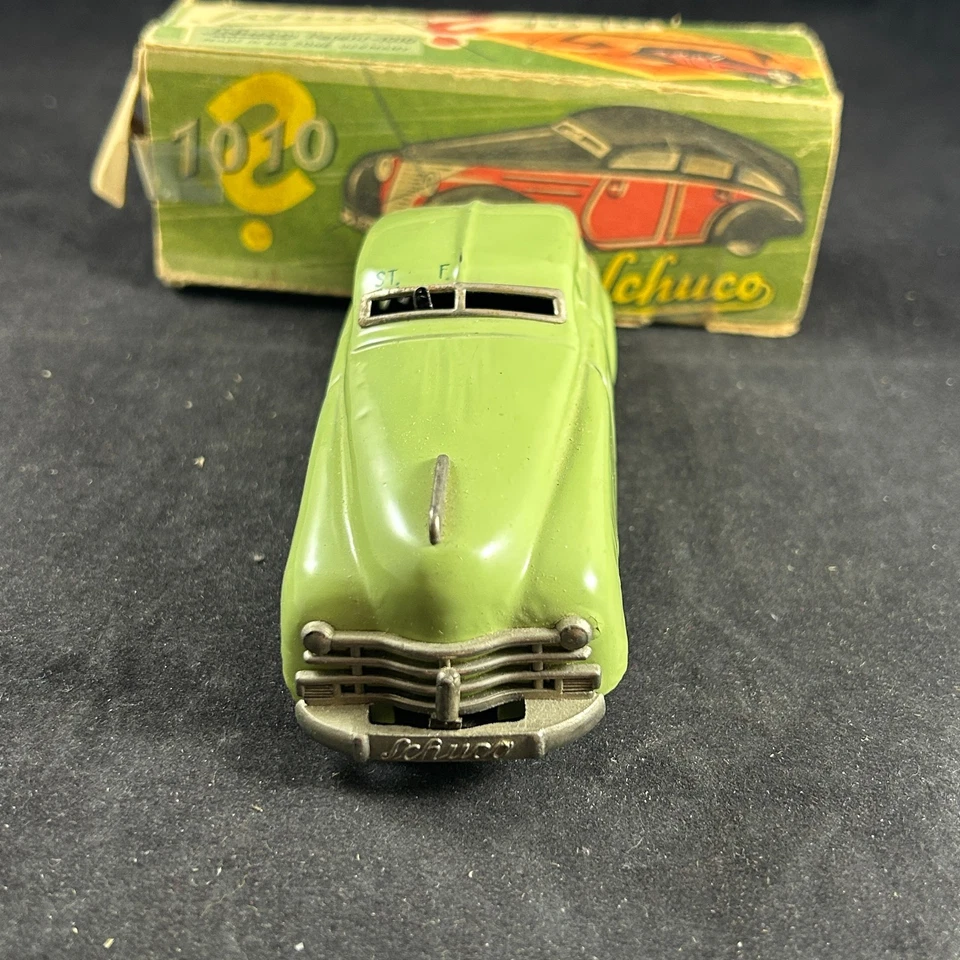SCHUCO 1010 PATENTE 1750 CUERDA DE COLECCIÓN ANTIGUO COMO NUEVO COCHE DE JUGUETE ZONA EE. UU. ALEMANIA CON CAJA Foto 3 de 4