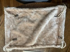 PET HAMMOCK WITH WOODEN DOWELS IN ENDS AND HAS ATTACHMENT HOOKS TO CAGE 16"