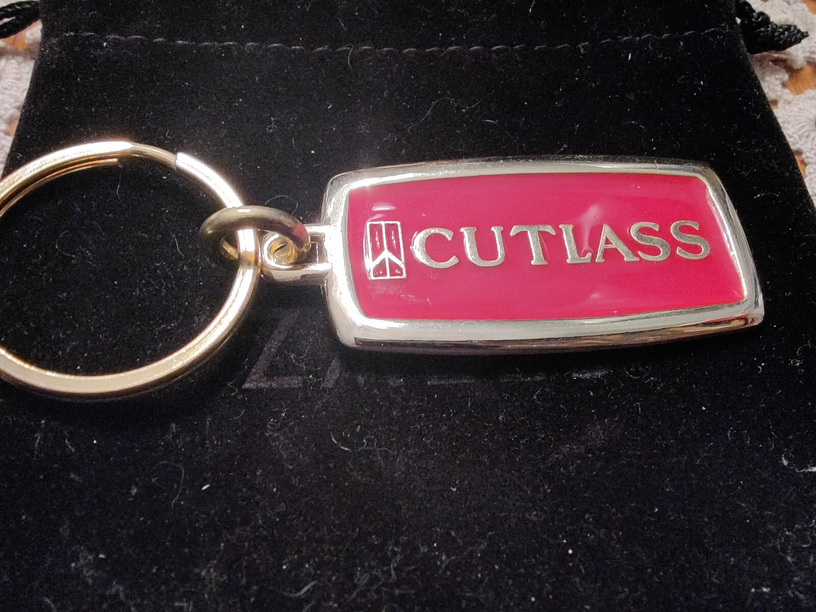 Porte clés vintage Cutlass Supreme, 442, Calais etc. Neuf dans son emballage d'origine par porteurs