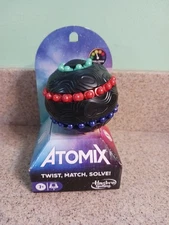 New Atomix Puzzle Sphere Game Brainteaser Fidget Toy for One Player Hasbro Kids