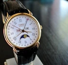 VINTAGE TIMEX TRIPLE DATE MOON PHASE DIAL QUARTZ MEN'S GOLDEN BLACK DRESS WATCH