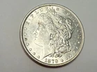 1879 Morgan U.S. silver dollar. AU-BU slider++. Nearly 100% luster. #em2
