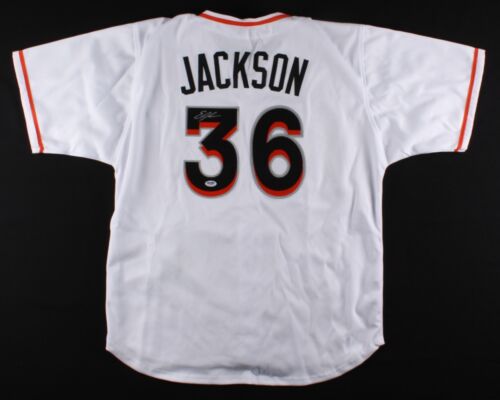 Camiseta deportiva firmada por Edwin Jackson de los Marlins (PSA Holograma) lanzada sin hits 25/06/10  - Imagen 1 de 4