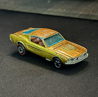 Hot Wheels Redlines 1967 Custom Mustang in Gold/Yellow w/ brown interior