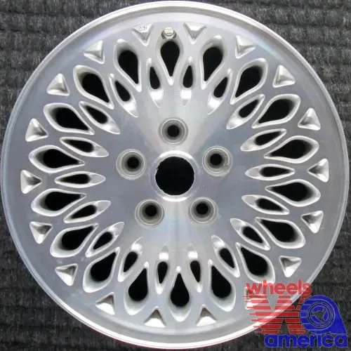 Llanta Chrysler Dodge Caravan Mini Ram Town and Country Voyager plateada OE 207 Foto 3 de 4