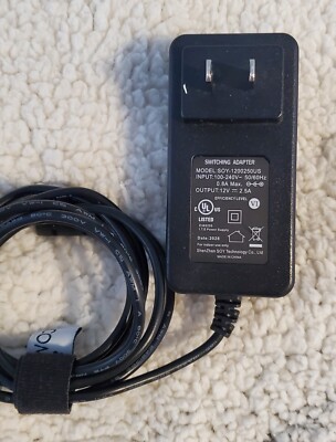SWITCHING ADAPTER MODEL SOY-1200300US 12V POWER SUPPLY Used
