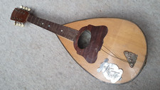 old mandolin, needs repair