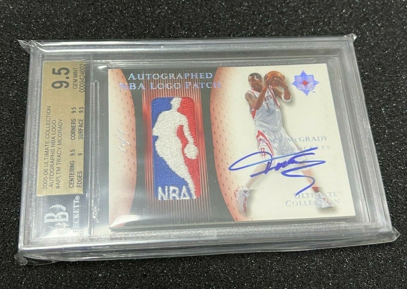 Image 1 - 2005-06 Tracy Mcgrady UD Ultimate Collection Logoman Patch Auto 1/1 BGS 9.5 10 