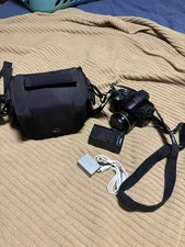 Canon PowerShot SX30 IS 14.1MP 35x Zoom Digital Camera OEM Charger & Battery Bag