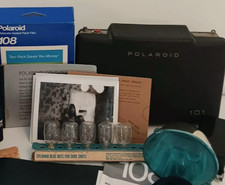 Lot Vintage Polaroid Camera 101, 108 Film, Flashgun 268, Sylvania M3 Flash Bulbs
