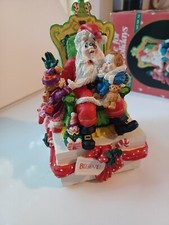 Vintage Santa's surprise music box home for the holidays series.1993 collector's