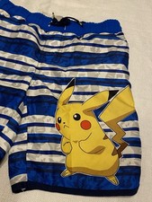 Pok mon Swim Trunks For Boys Size 6-7. Multicolored