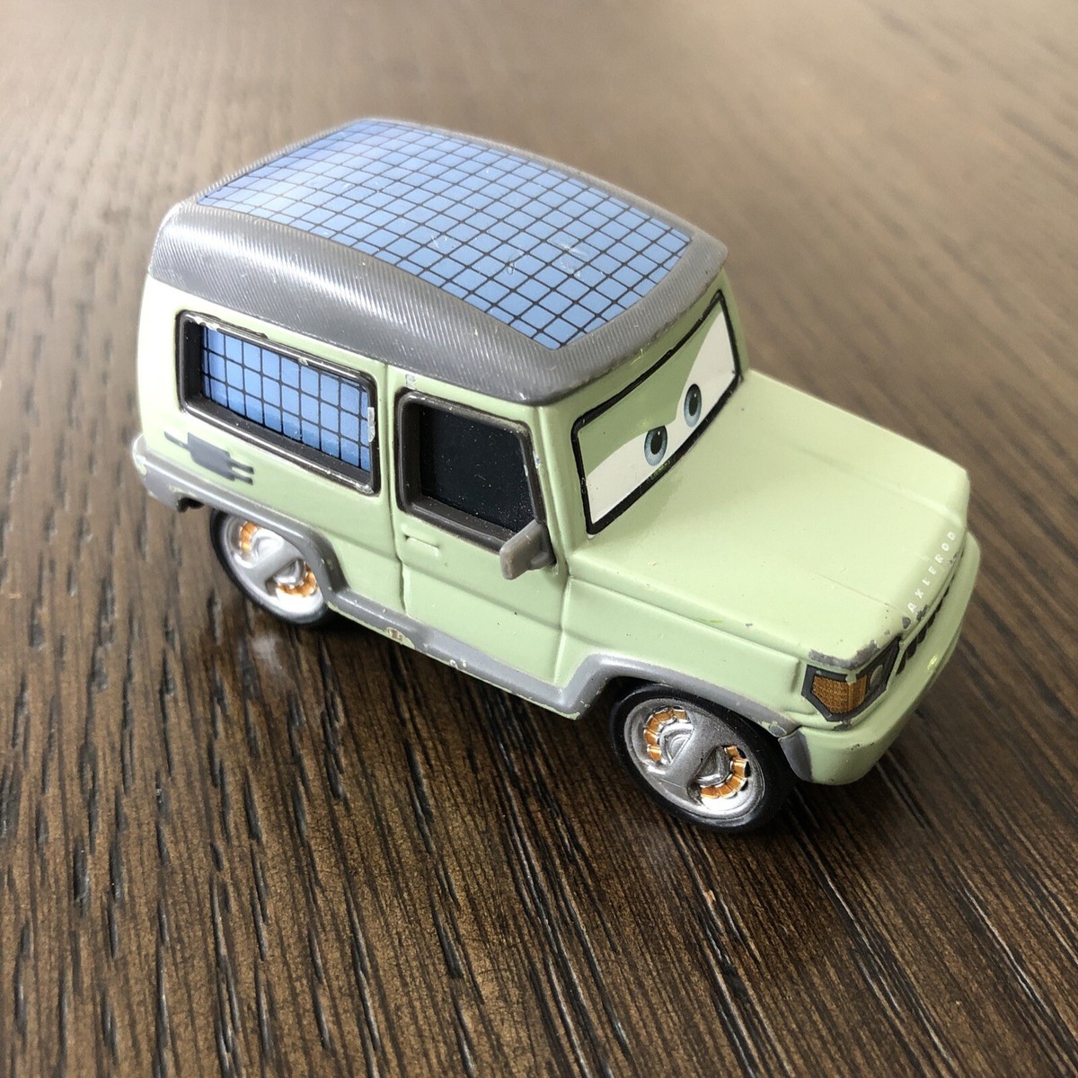 Mattel Disney Pixar Cars 2 MILES AXLEROD #17 Car 1:55 Checkerboard