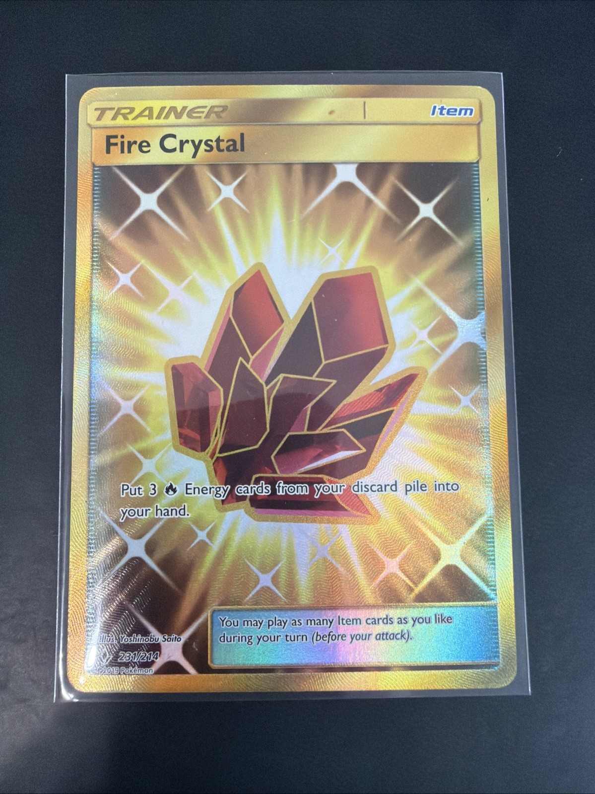 Fire Crystal 231/214 Unbroken Bonds Gold Secret Rare NM