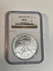 2004 SILVER EAGLE. MS 69 BROWN LABLE