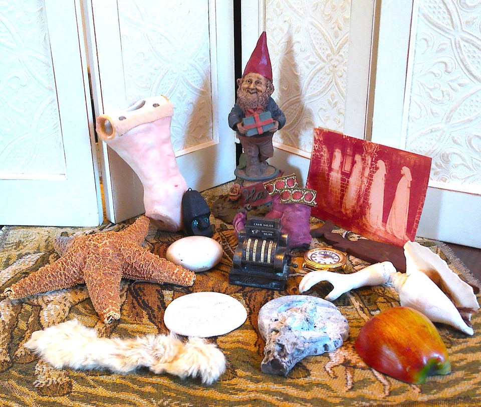 A curated cabinet-of-curiosities lot of found objects and vintage oddities — basically someone's dark academia shelf in a box.