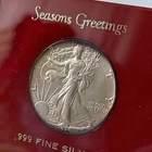 1987 Silver Eagle Coin in Capital Plastic Holder "Seasons Greetings"