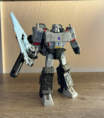Hasbro Transformers Two Megatron WFC Siege Figures.