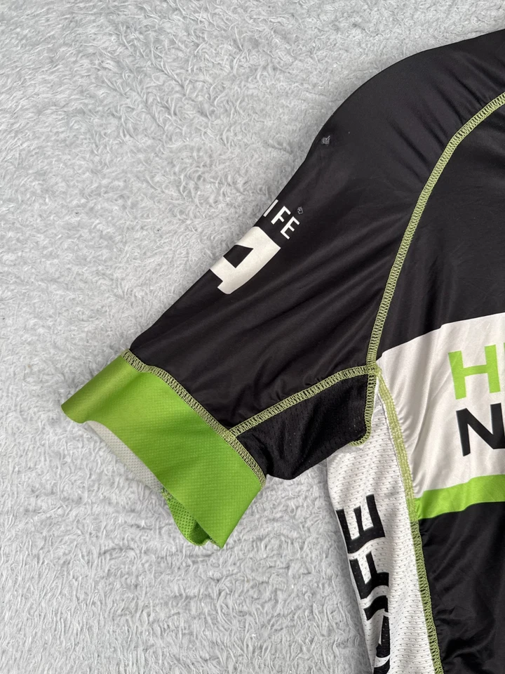 Camiseta deportiva de ciclismo Hincapi para mujer verde mediana negra Herbalife cremallera completa manga corta Foto 3 de 4