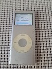 Apple iPod Nano A1199 Silver 4Gb. A Lot Of Scuffs & Scrapes But Working