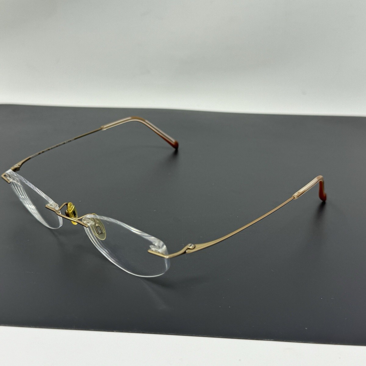 Charmant CH8331 BR Titanium Rimless EYEGLASSES FRAMES 48 19- 135