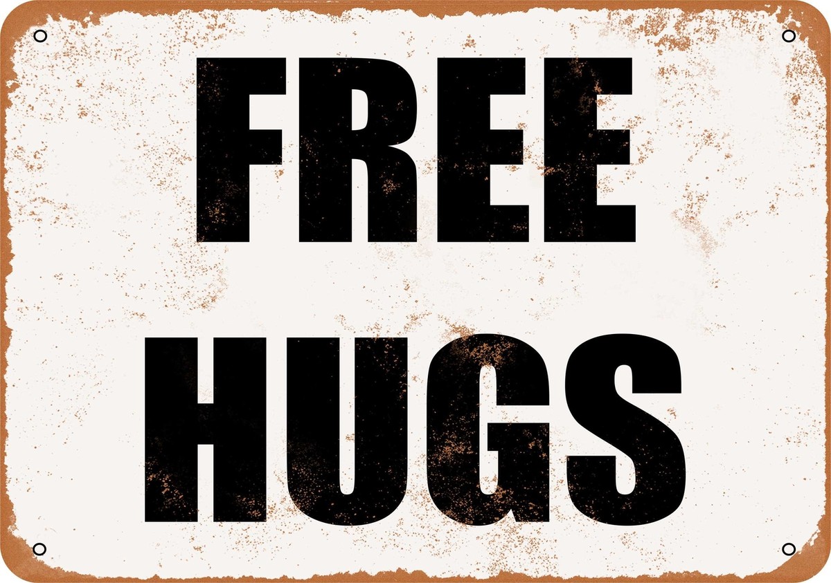 Free Hugs Sign By Free Hugs Written On Colorful Background Stock Photo