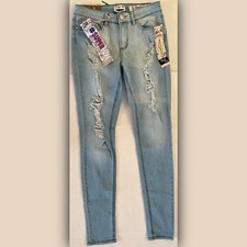 INDIGO REIN SKINNY JEANS Women  s JUNIOR's size:9 Mid rise distressed light wash