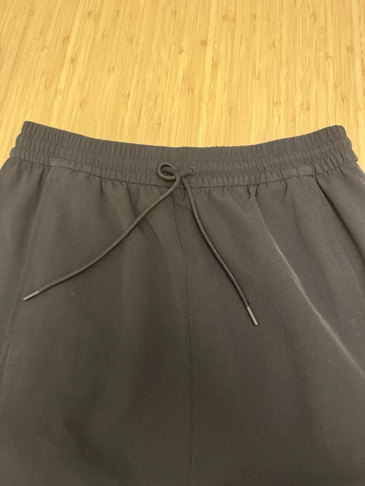 Falda Athleta Para Mujer Athleisure Línea A S/P Negra Elastizada Bolsillos con Cremallera Foto 2 de 4