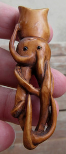 VINTAGE WOOD CARVED NETSUKE SQUID OR OCTOPUS ARTIST SIGNED