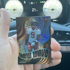 Revolution Rookie Emeka Egbuka Buccaneers New Wave Insert Football Card