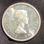 1964 Canada 25 Cents Silver Coin - AU (About Uncirculated) condition
