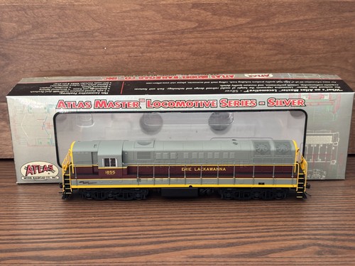Locomotora Atlas Erie Lackawanna Train Master 1855 necesita mantenimiento molduras daños | Condition: New: Other (See Details)