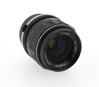 Tokina Wide Auto 35mm f/2.8  – Très bon état – Série 7402778 Olympus OM