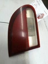 95 96 97 98 99 CAVALIER L. TAIL LIGHT LID MTD 119104