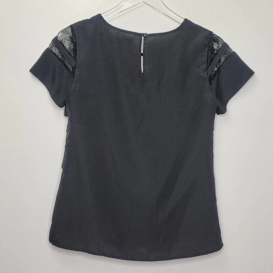 Top de encaje floral The Limited XS negro manga corta cuello redondo fiesta caprichosa Foto 2 de 4