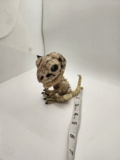 WowWee Fingerlings Glow in the Dark Bonehead Raptor skeleton DOOM pre-owned