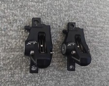 shimano xt m775 disc brake calipers set post mount front rear